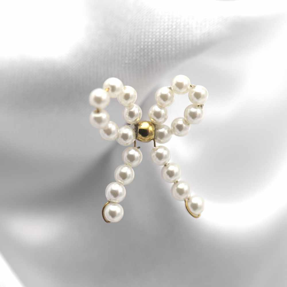 Cute pearl bow - OORBEL